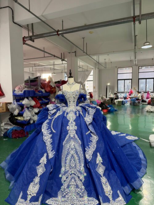 Radiant Deep Blue Quinceanera Dress Sleeveless Ivory Lace Pattern Quinceanera Dress Voluminous Tulle Ball Gown Traditional Mexican Gown